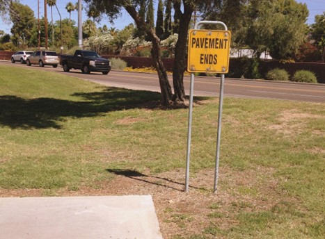 Pavement Ends warning sign at end of paved pathway