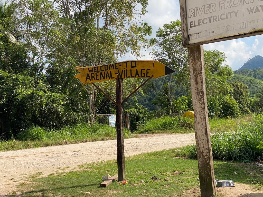 Sign: Welcome to Arenal Village